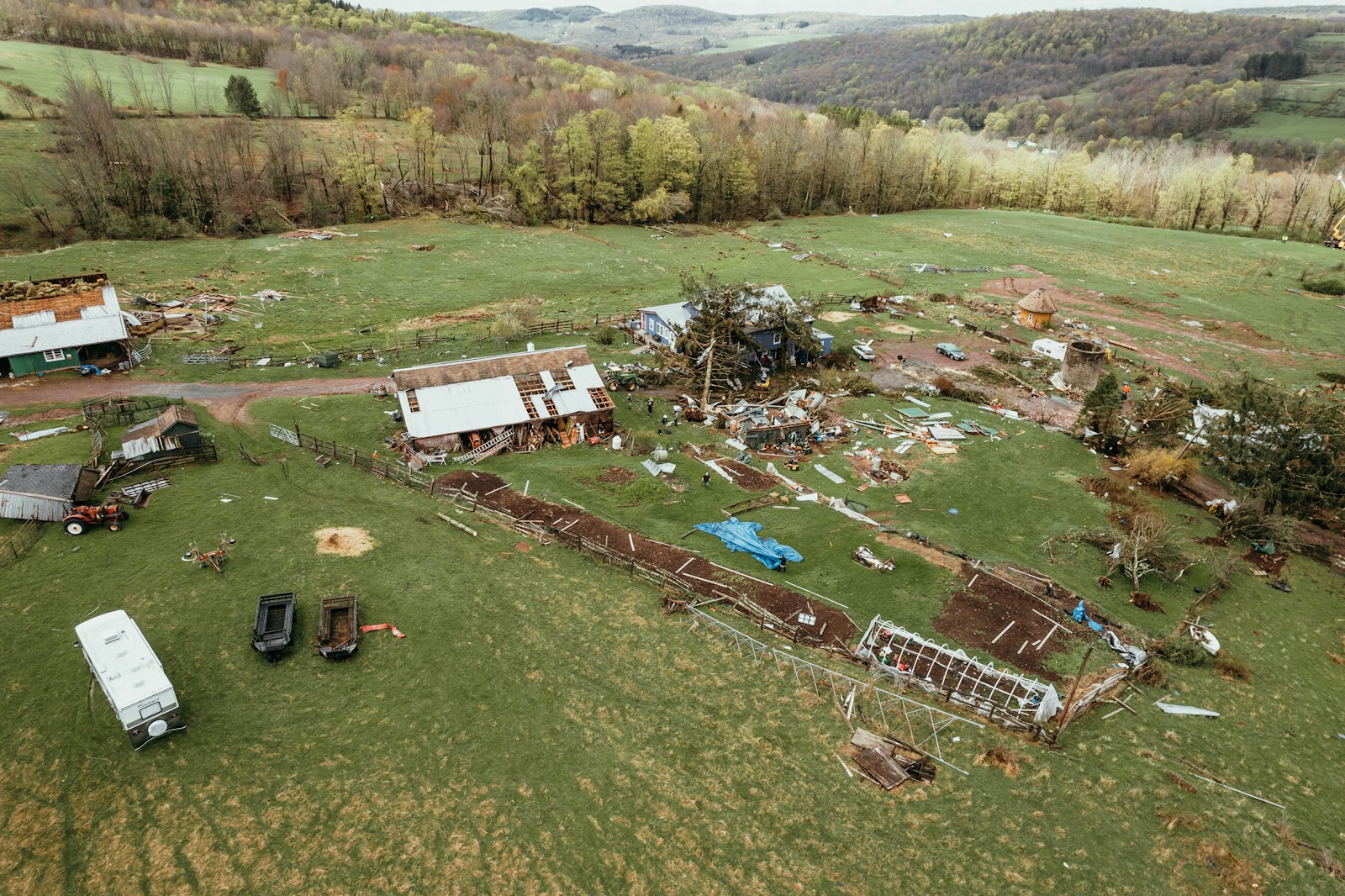 an aerial view of a farm with a lot of debris